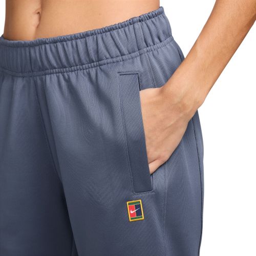 Spodnie do tenisa damskie NikeCourt Heritage Windrunner FZ6509